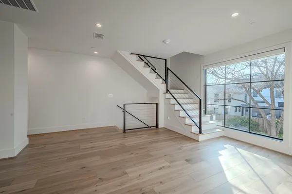 a view of entryway with wooden floor