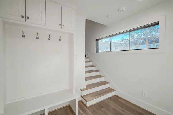 a view of entryway with wooden floor