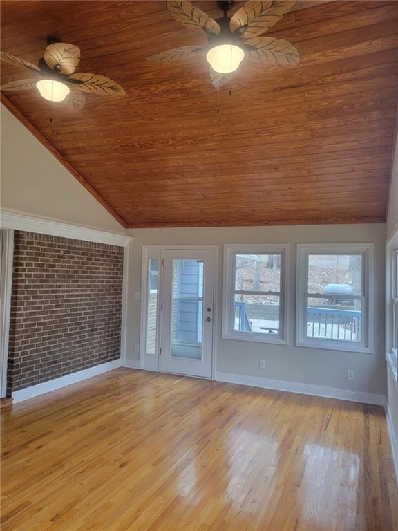 3370 Westbrook Road Suwanee, GA 30024 - Photo 12 of 43 a view of an empty room with window and wooden floor
