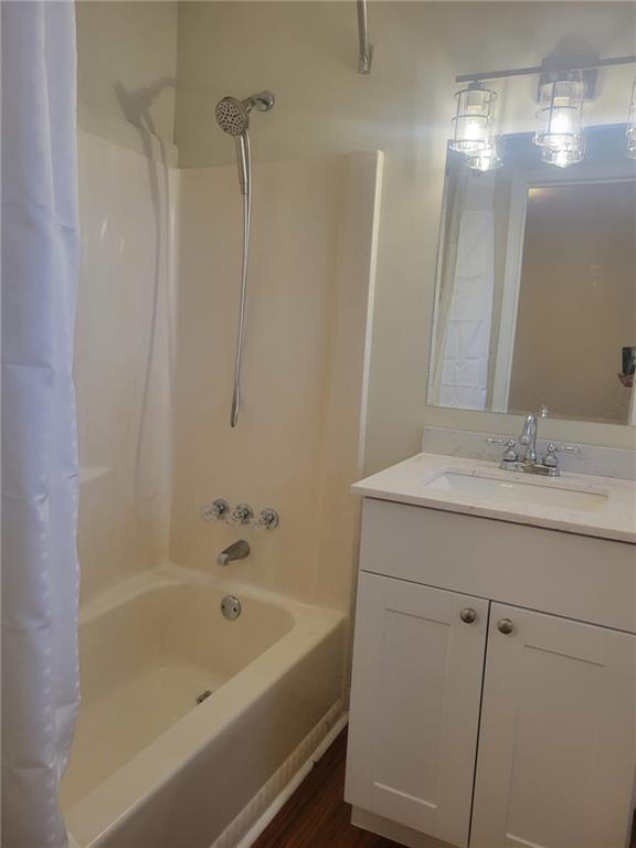 3370 Westbrook Road Suwanee, GA 30024 - Photo 32 of 43 a bathroom with a granite countertop sink a toilet and shower