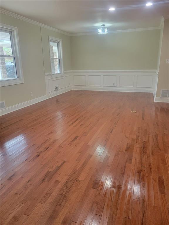3370 Westbrook Road Suwanee, GA 30024 - Photo 39 of 43 a view of empty room with wooden floor and fan