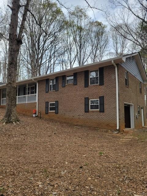 3370 Westbrook Road Suwanee, GA 30024 - Photo 6 of 43 a house view with a outdoor space