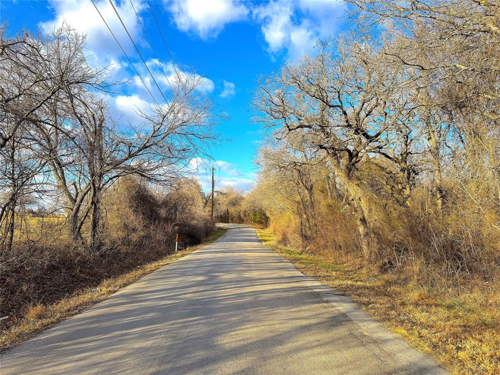 Tbd Turpin Lake Road Poolville, TX 76487 - Photo 5 of 35 a view of backyard of a house