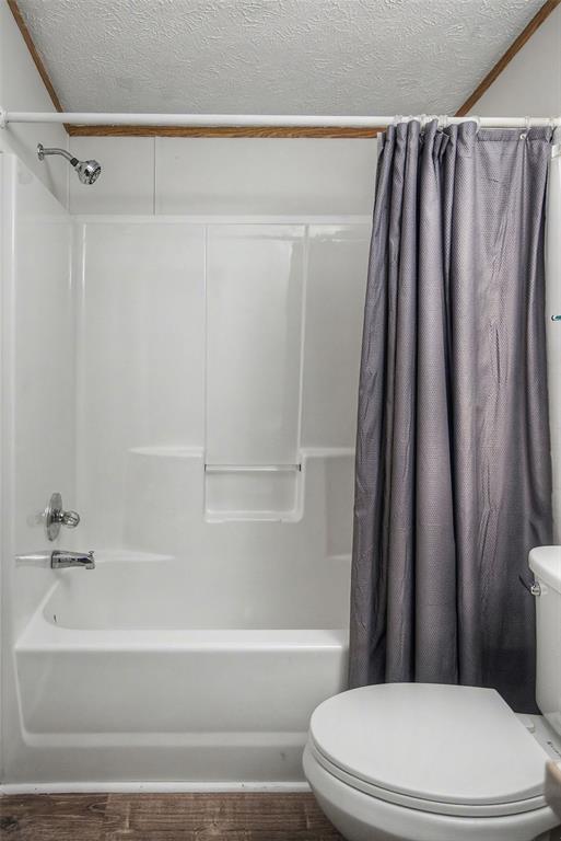 1202 Princeton Road Princeton, LA 71067 - Photo 11 of 19 White fiberglass tub and shower combination with chrome fixtures