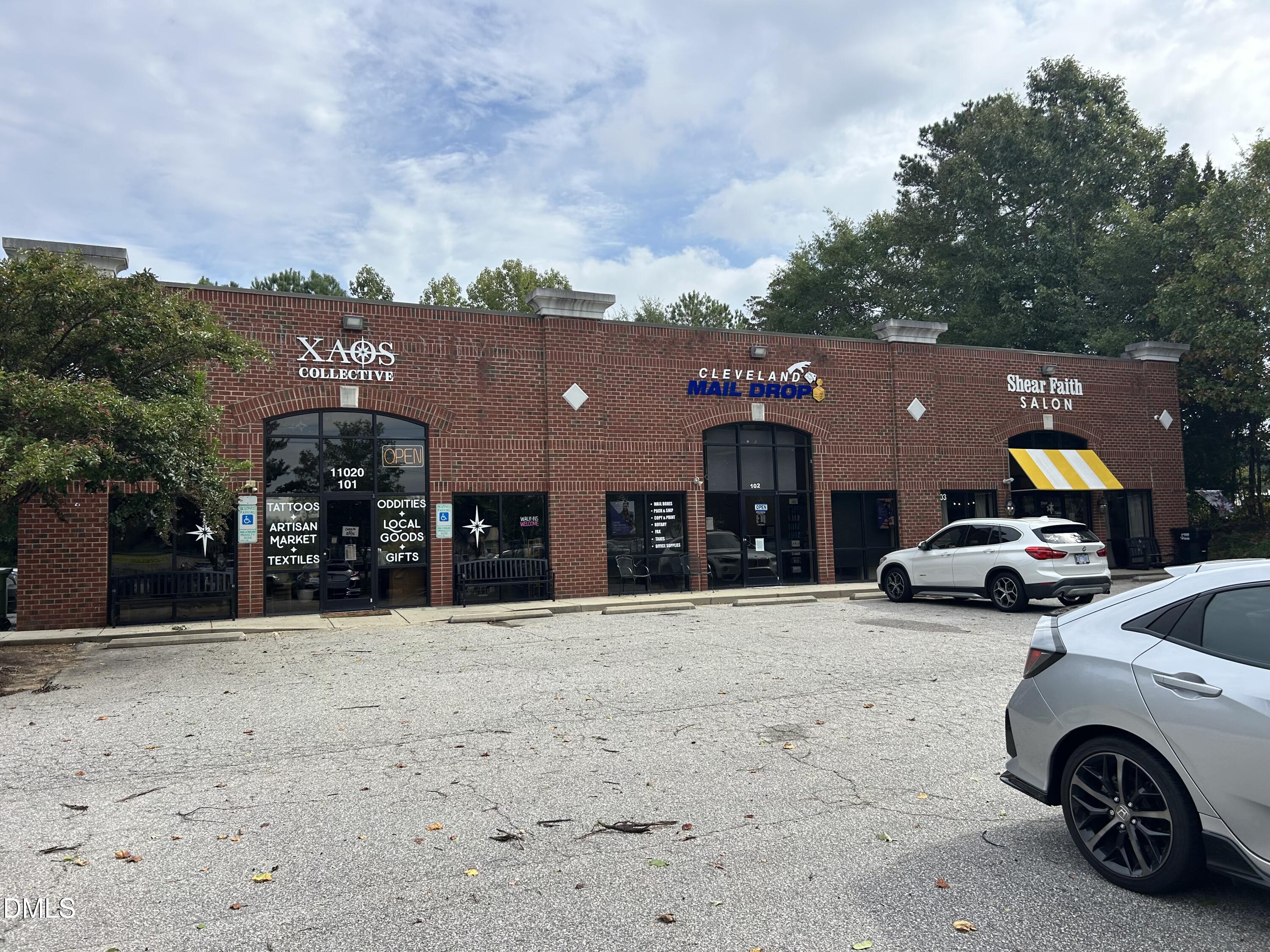 11114 Cleveland Road Garner, NC 27529 - Photo 21 of 26 a car parked in front of a house