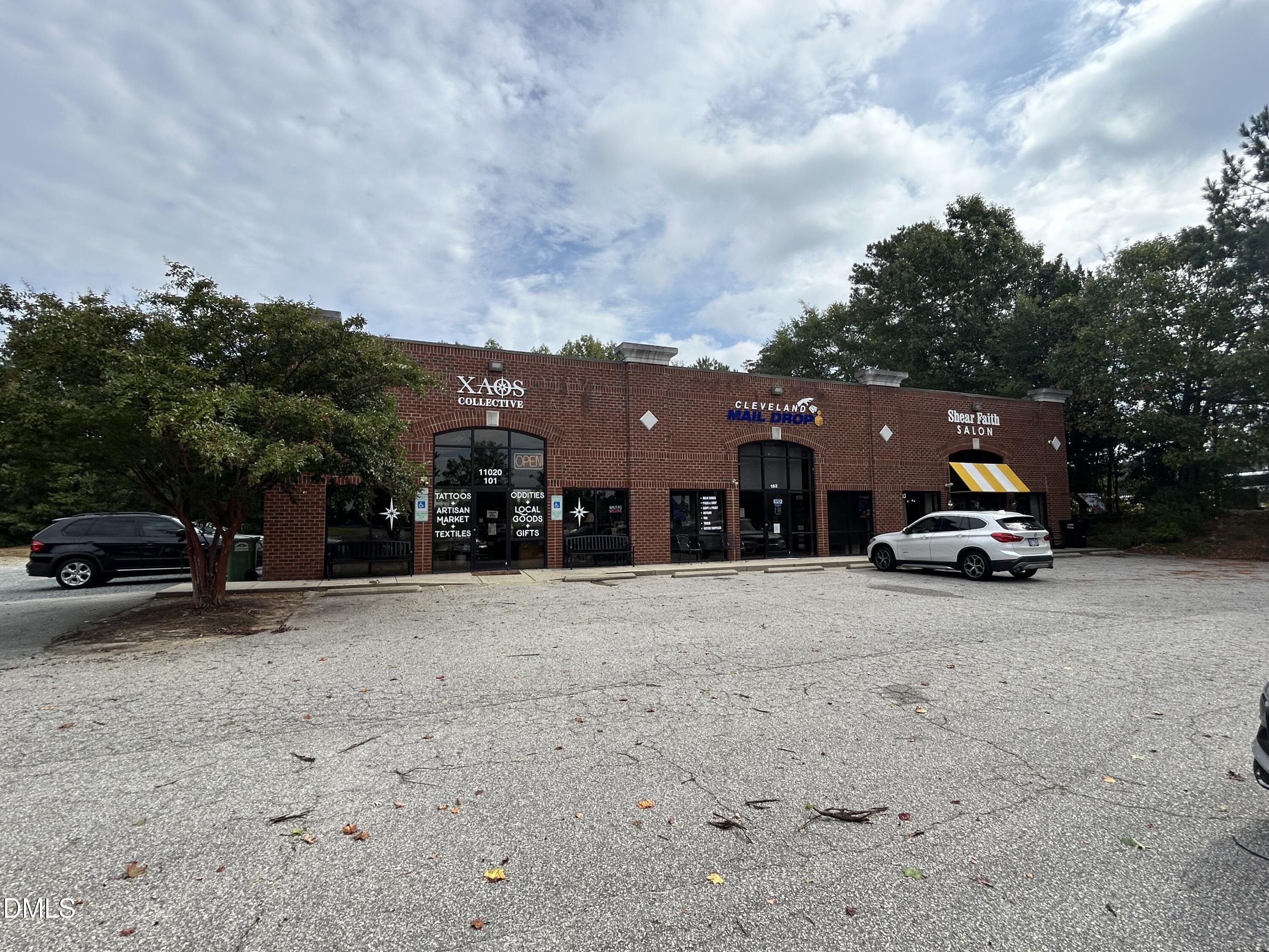 11114 Cleveland Road Garner, NC 27529 - Photo 22 of 26 a car parked on the side of the road
