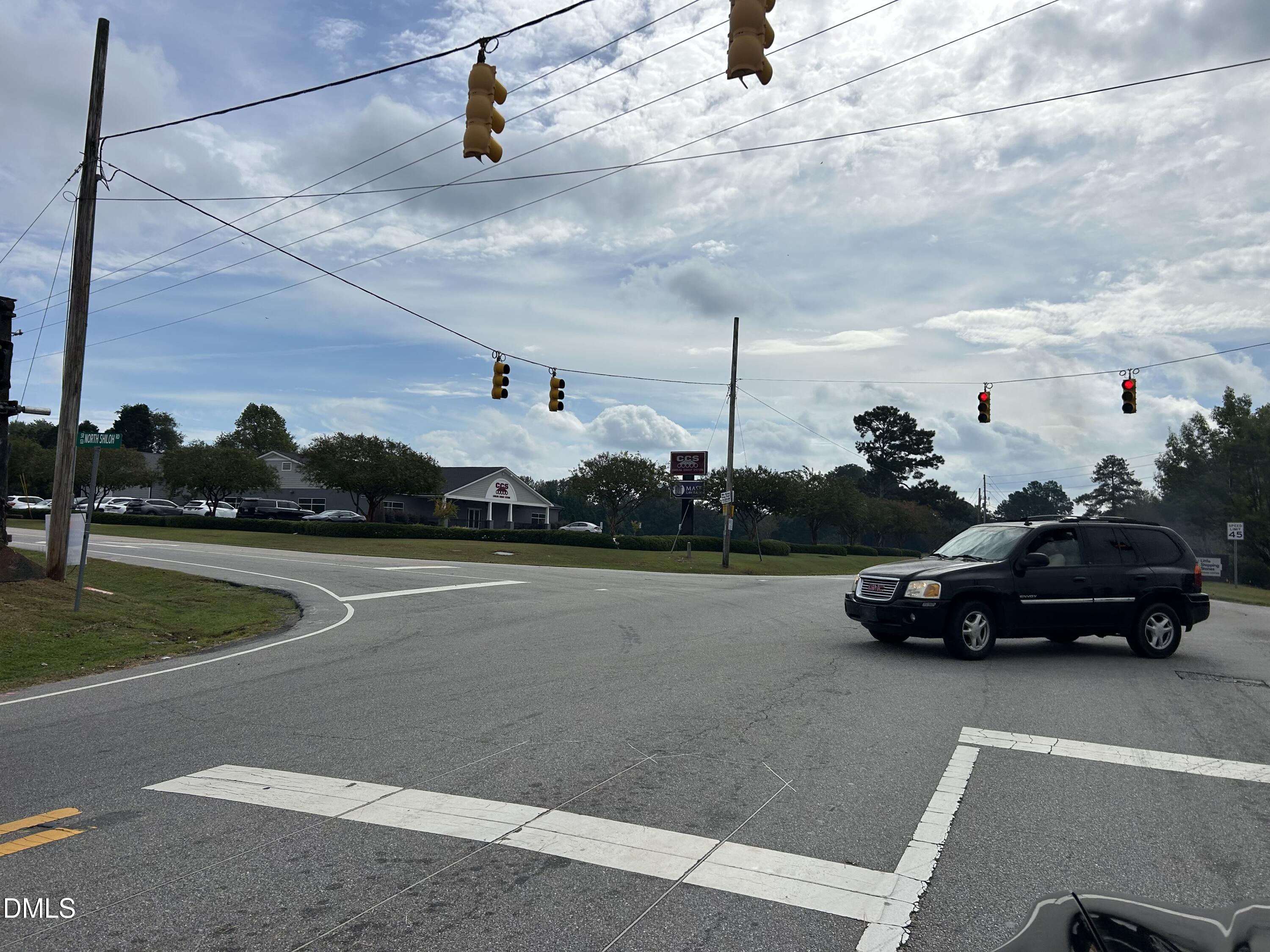 11114 Cleveland Road Garner, NC 27529 - Photo 24 of 26 a car parked on the side of the road