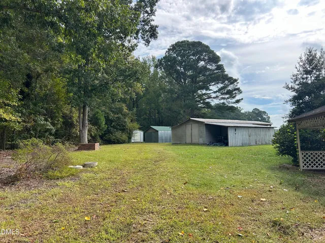 a house with trees in front of it