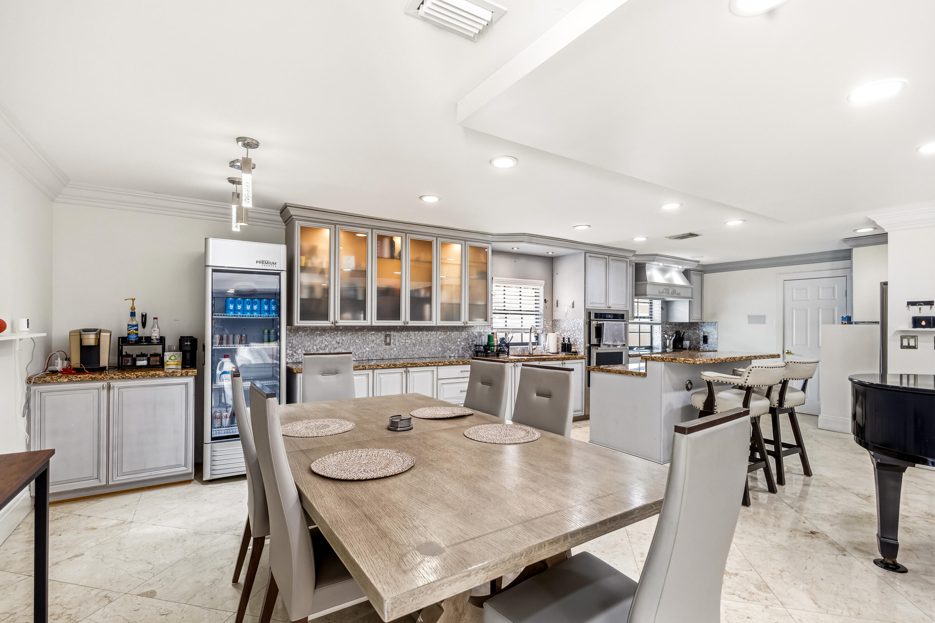 5223 Deerhurst Crescent Circle Boca Raton, FL 33486 - Photo 28 of 51 a view of a dining room with furniture