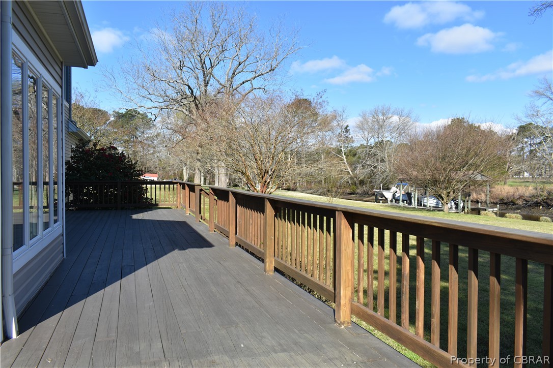163 Mill Lane Road Cardinal, VA 23025 - Photo 10 of 50 a view of a balcony with wooden fence