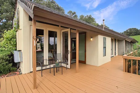 a view of a house with sitting area