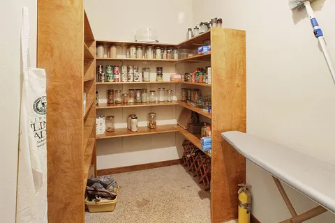 a view of a workspace with furniture