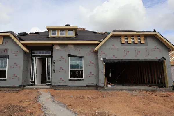 a view of a car garage of a house