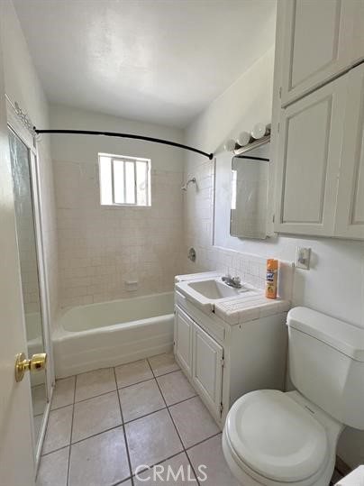33671 Beverly Drive Hemet, CA 92545 - Photo 11 of 15 a bathroom with a granite countertop toilet a sink and bathtub