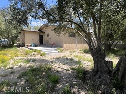 33671 Beverly Drive Hemet, CA 92545 - Photo 14 of 15 a house that has a tree in front of it