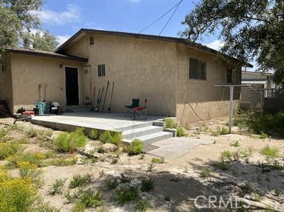 33671 Beverly Drive Hemet, CA 92545 - Photo 15 of 15 a front view of a house with a yard