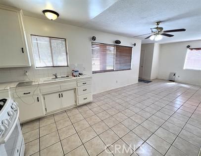 33671 Beverly Drive Hemet, CA 92545 - Photo 5 of 15 a spacious bathroom with a double vanity sink mirror and a bathtub