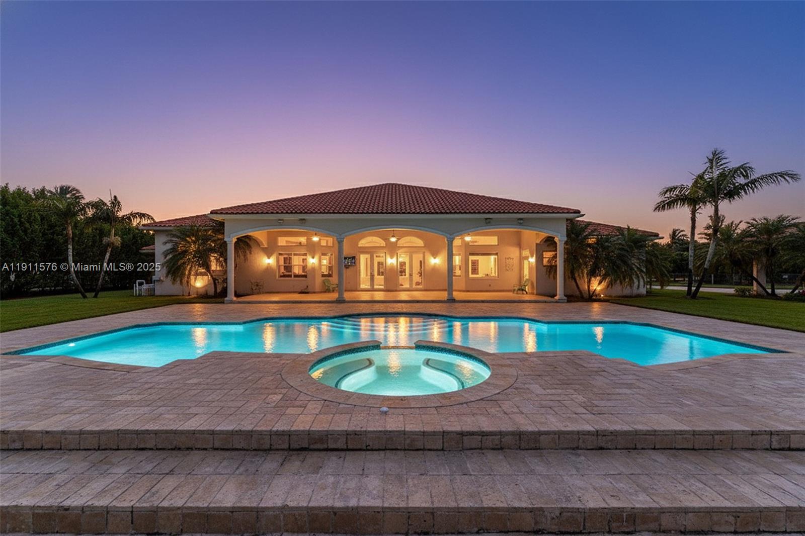 a view of swimming pool with a yard