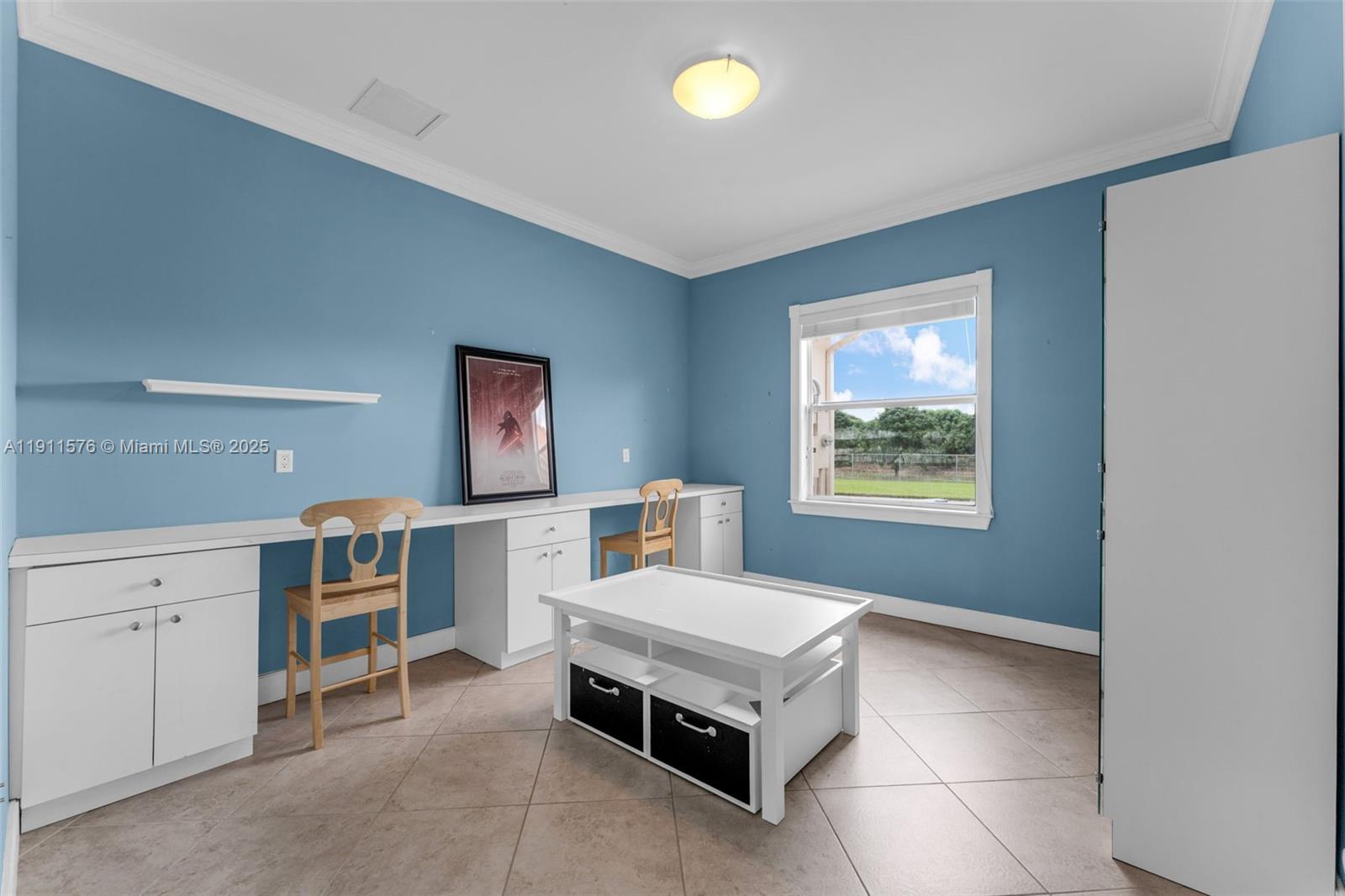15050 Southwest 179th Avenue Miami, FL 33196 - Photo 23 of 46 a living room with furniture and window