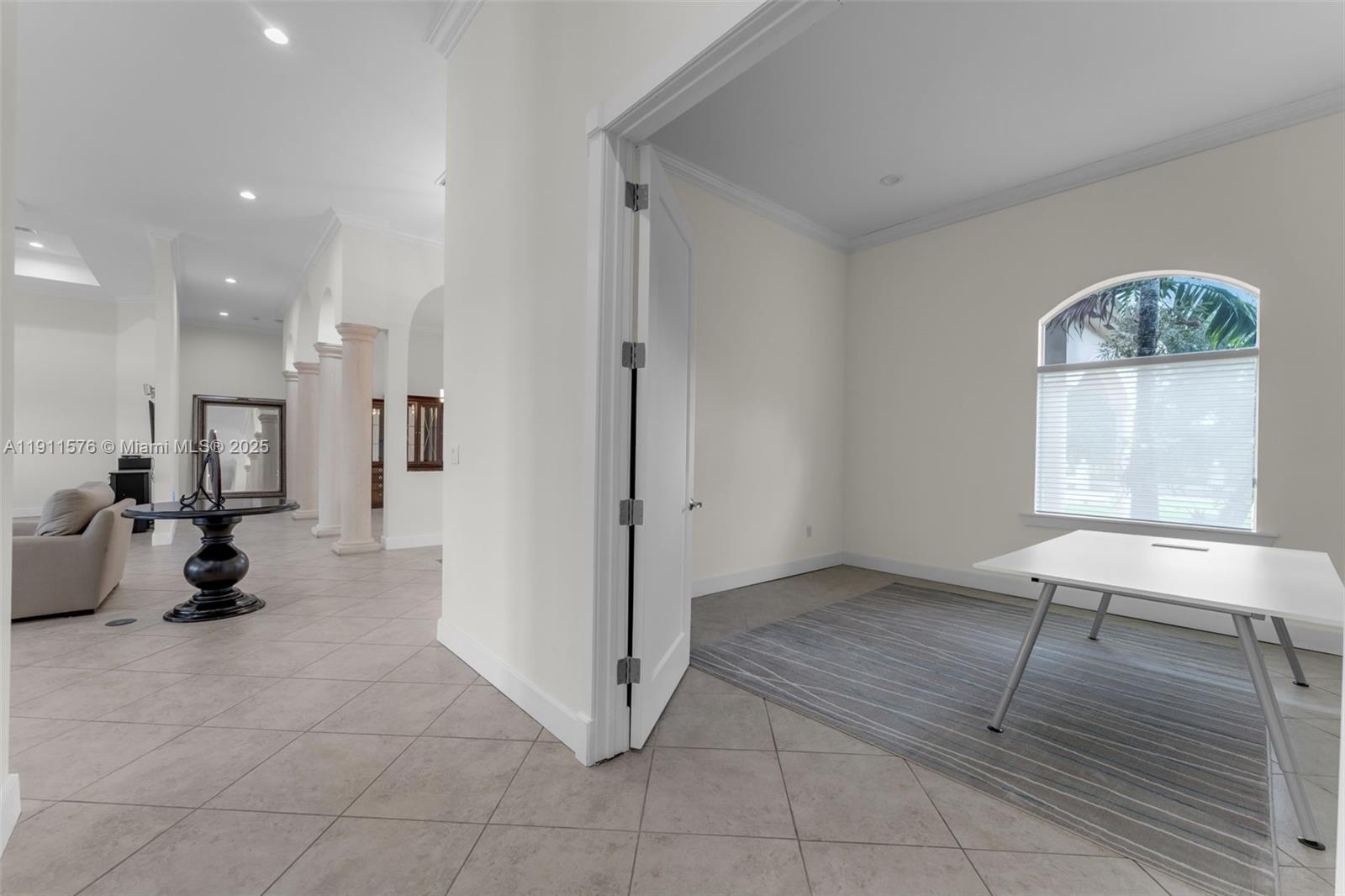 15050 Southwest 179th Avenue Miami, FL 33196 - Photo 26 of 46 a view of a room with gym equipment and windows