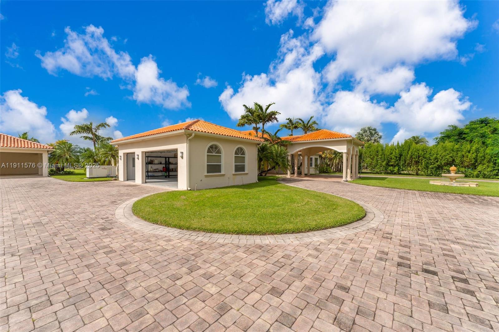 15050 Southwest 179th Avenue Miami, FL 33196 - Photo 30 of 46 a blue swimming pool with yard in front of it