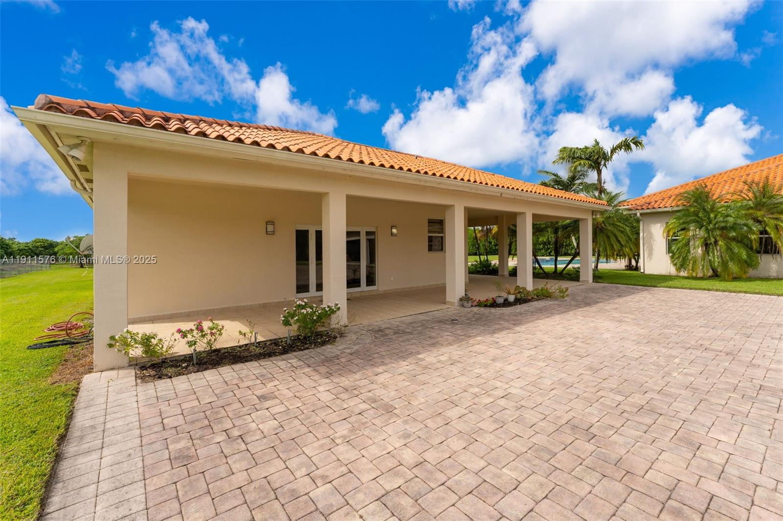 15050 Southwest 179th Avenue Miami, FL 33196 - Photo 32 of 46 a view of a house with backyard