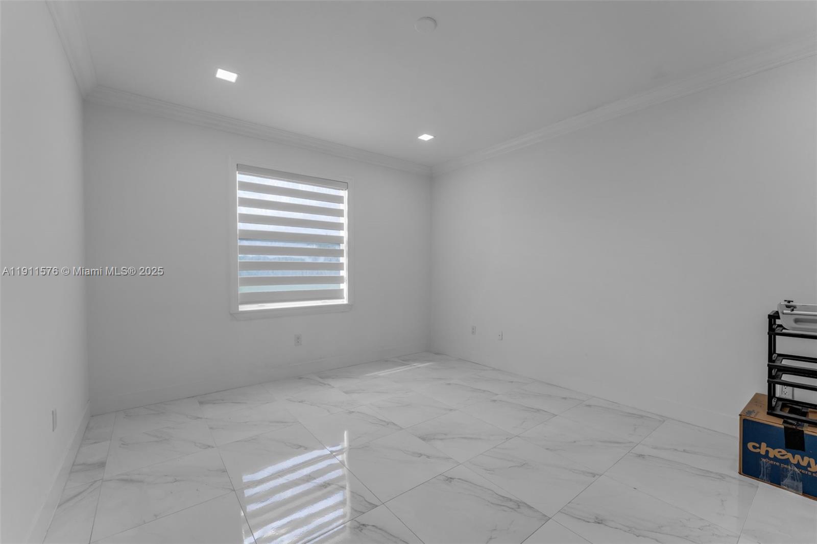 15050 Southwest 179th Avenue Miami, FL 33196 - Photo 42 of 46 a view of an empty room with a window