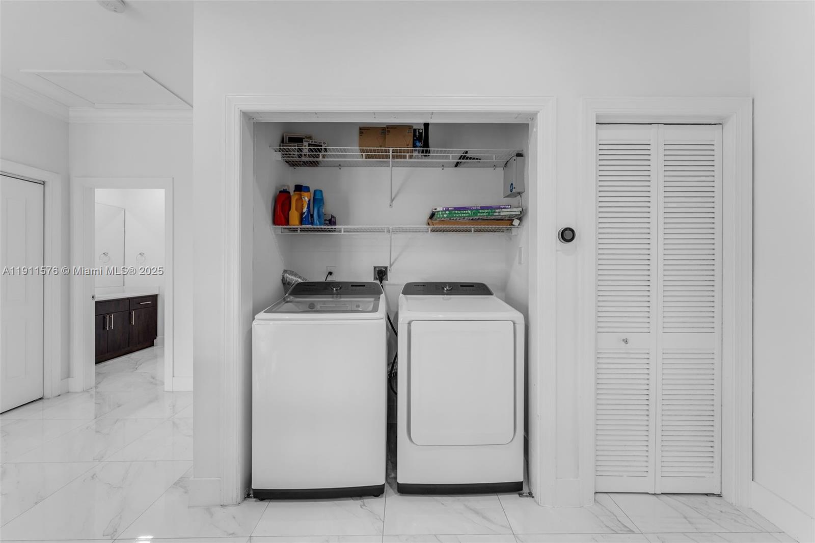 15050 Southwest 179th Avenue Miami, FL 33196 - Photo 43 of 46 a utility room with dryer and washer