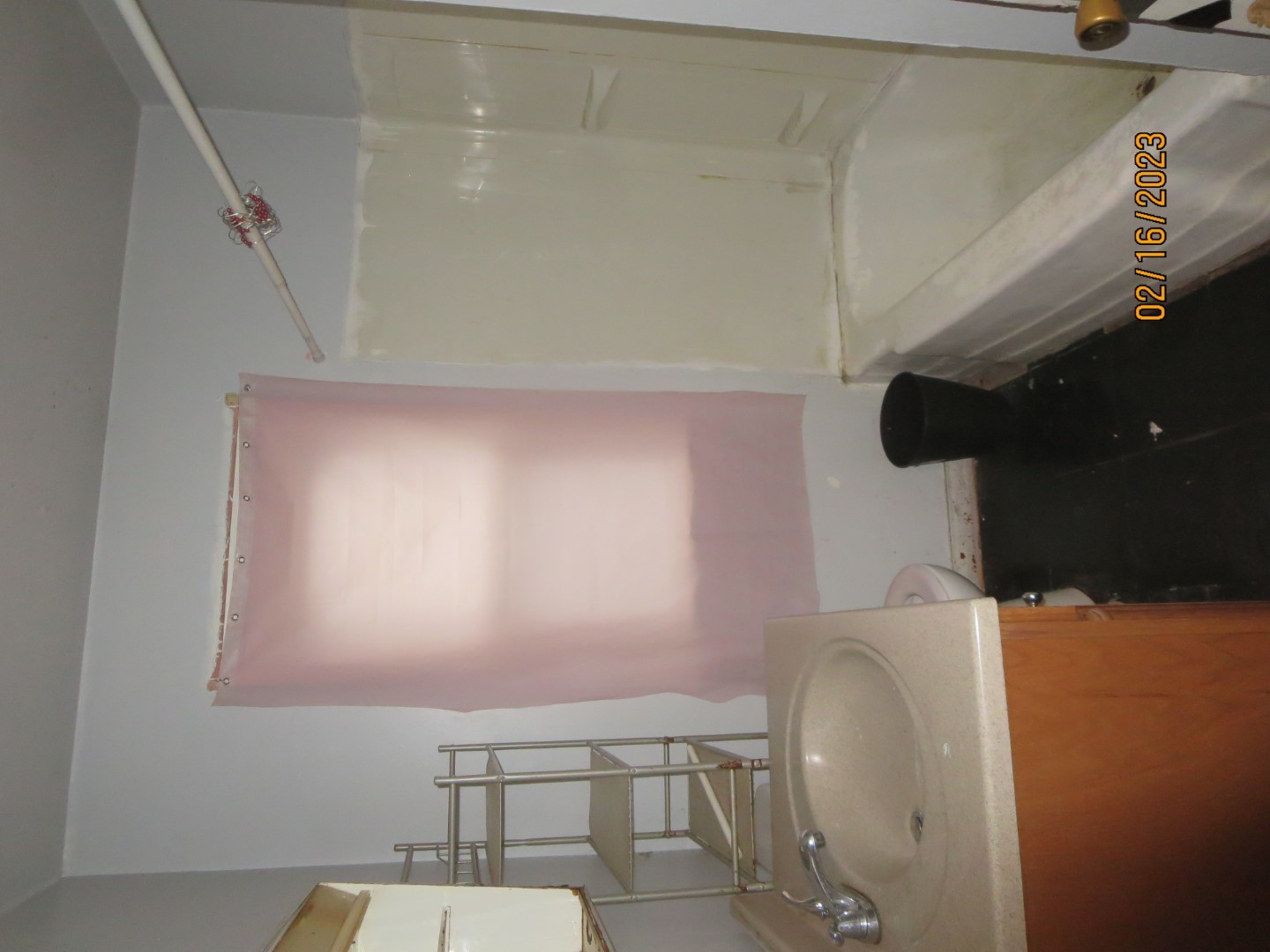 1224 East Chestnut Street Kankakee, IL 60901 - Photo 9 of 10 a bathroom with a sink and a mirror