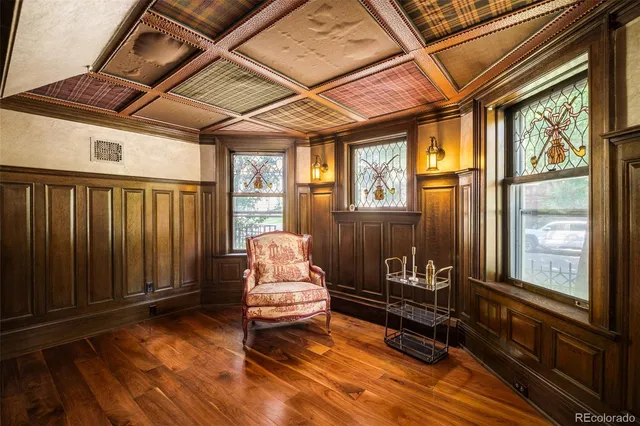 a spacious bedroom with a bed and a fireplace