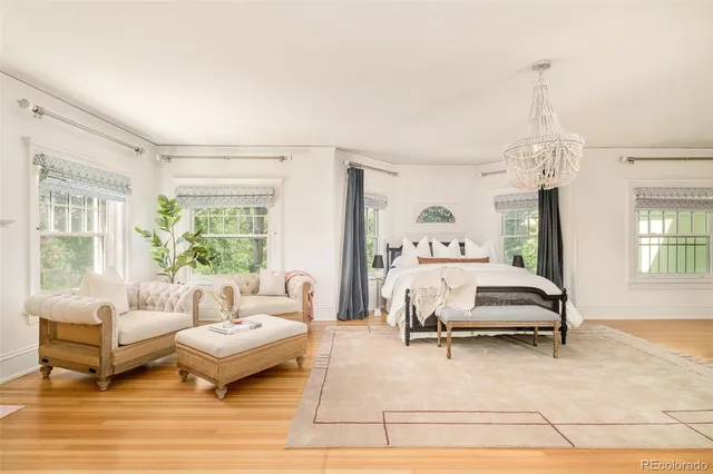 a bathroom with bathtub and window