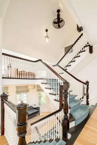 a bathroom with a granite countertop sink a mirror and vanity