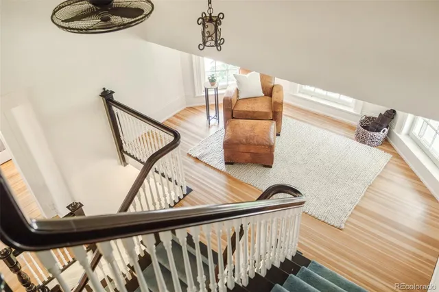 a bedroom with a bed and a table