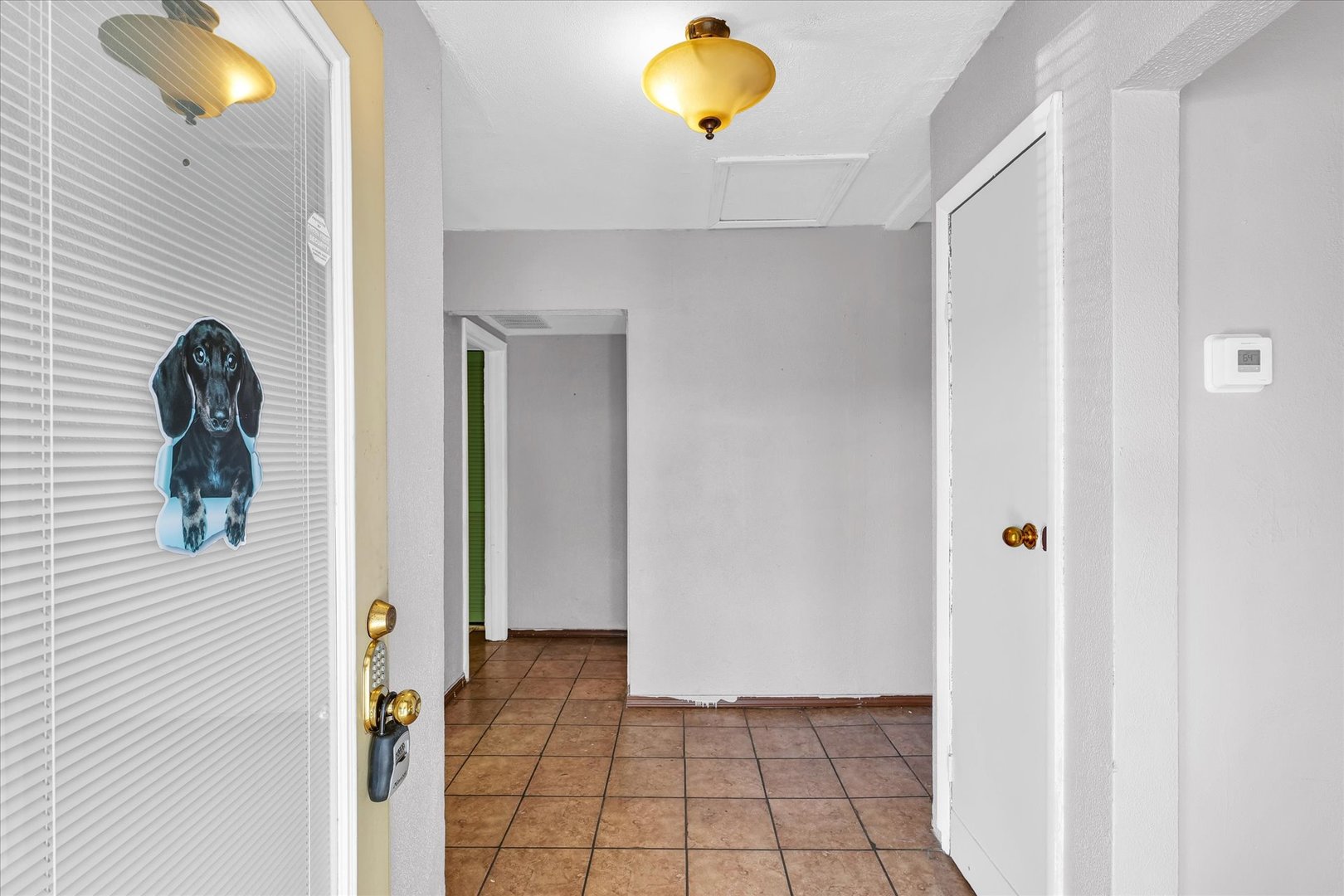 309 South Main Street Elliott, IL 60933 - Photo 12 of 44 a view of a hallway to the closet and a living room