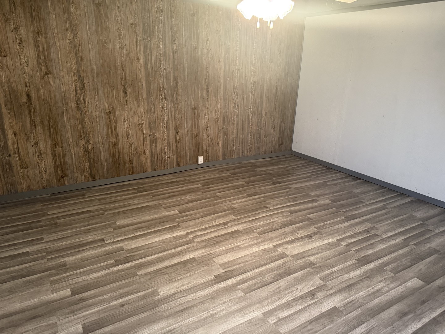 309 South Main Street Elliott, IL 60933 - Photo 26 of 44 a view of empty room with wooden floor