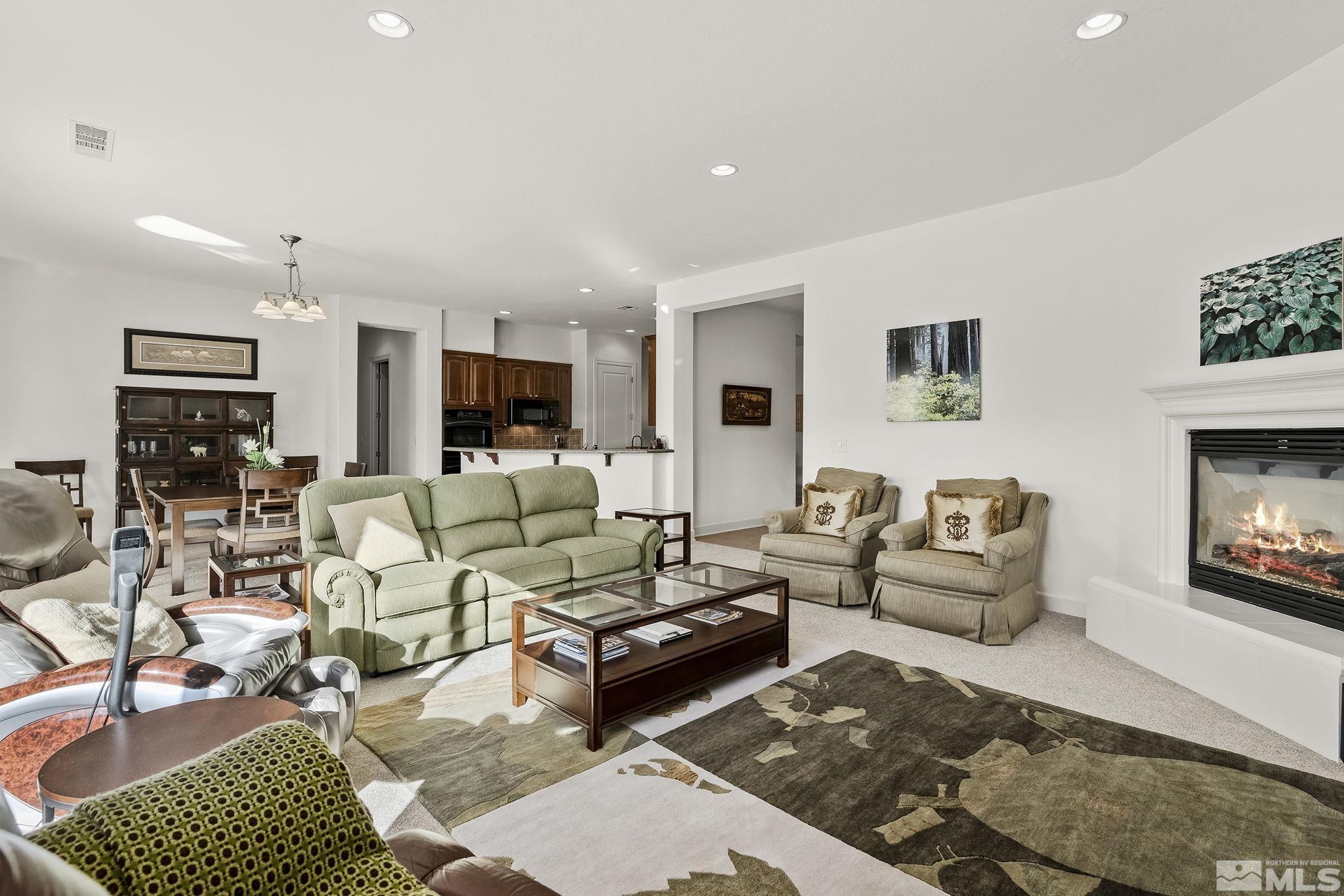 1455 Meridian Ranch Drive Reno, NV 89523 - Photo 5 of 33 a living room with furniture and a fireplace