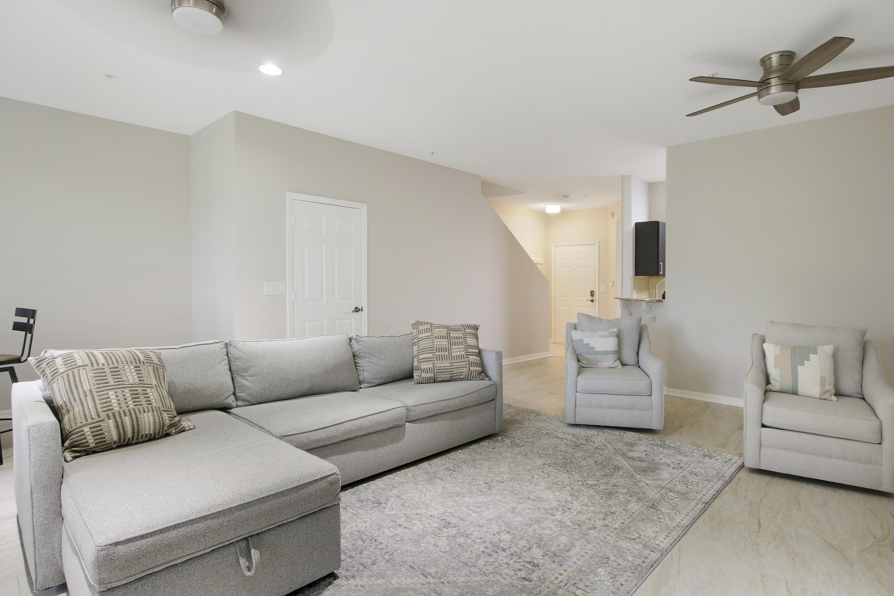 115 Lighthouse Circle, Unit D Tequesta, FL 33469 - Photo 14 of 28 a living room with furniture