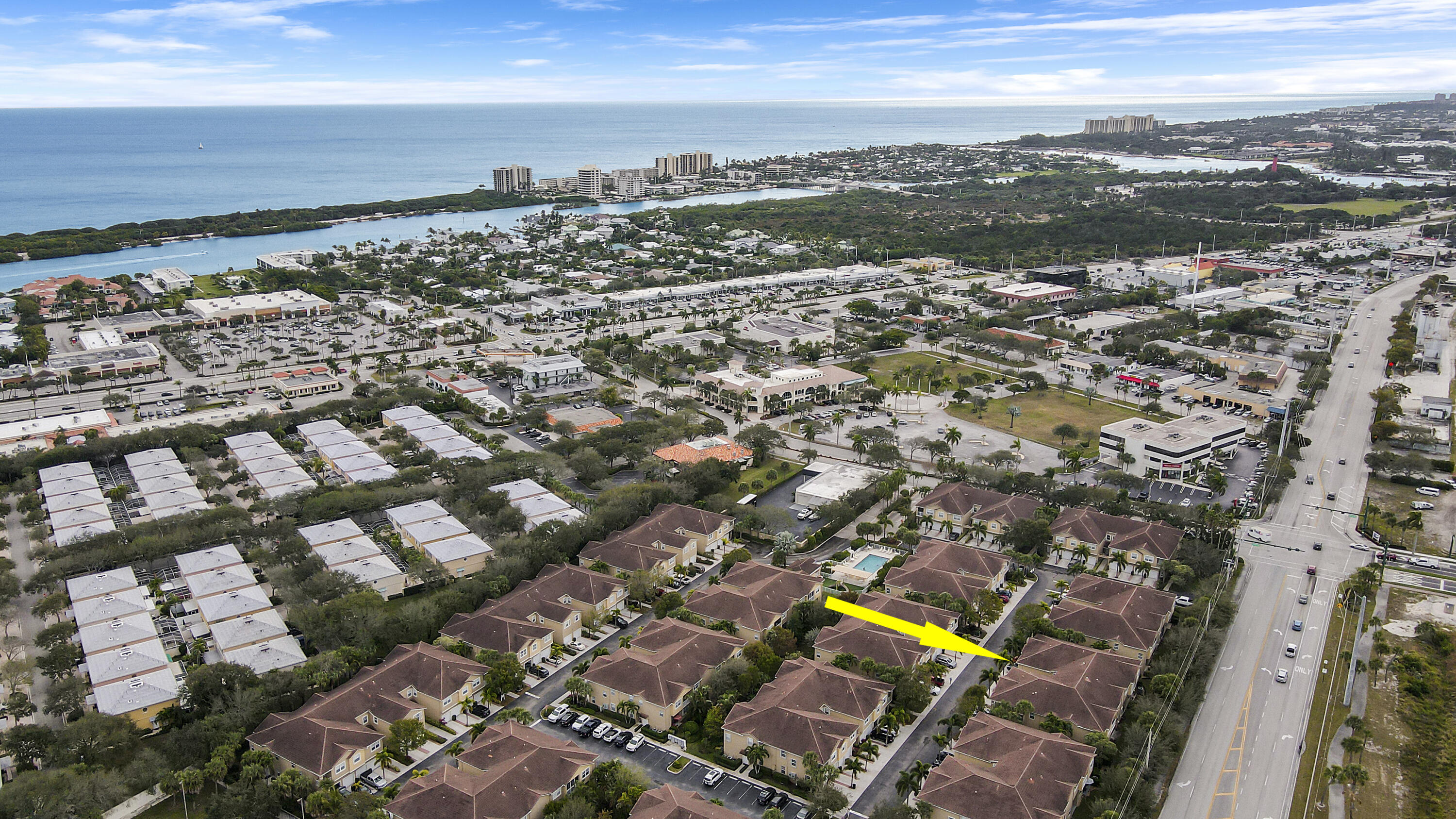 115 Lighthouse Circle, Unit D Tequesta, FL 33469 - Photo 2 of 28 an aerial view of a city