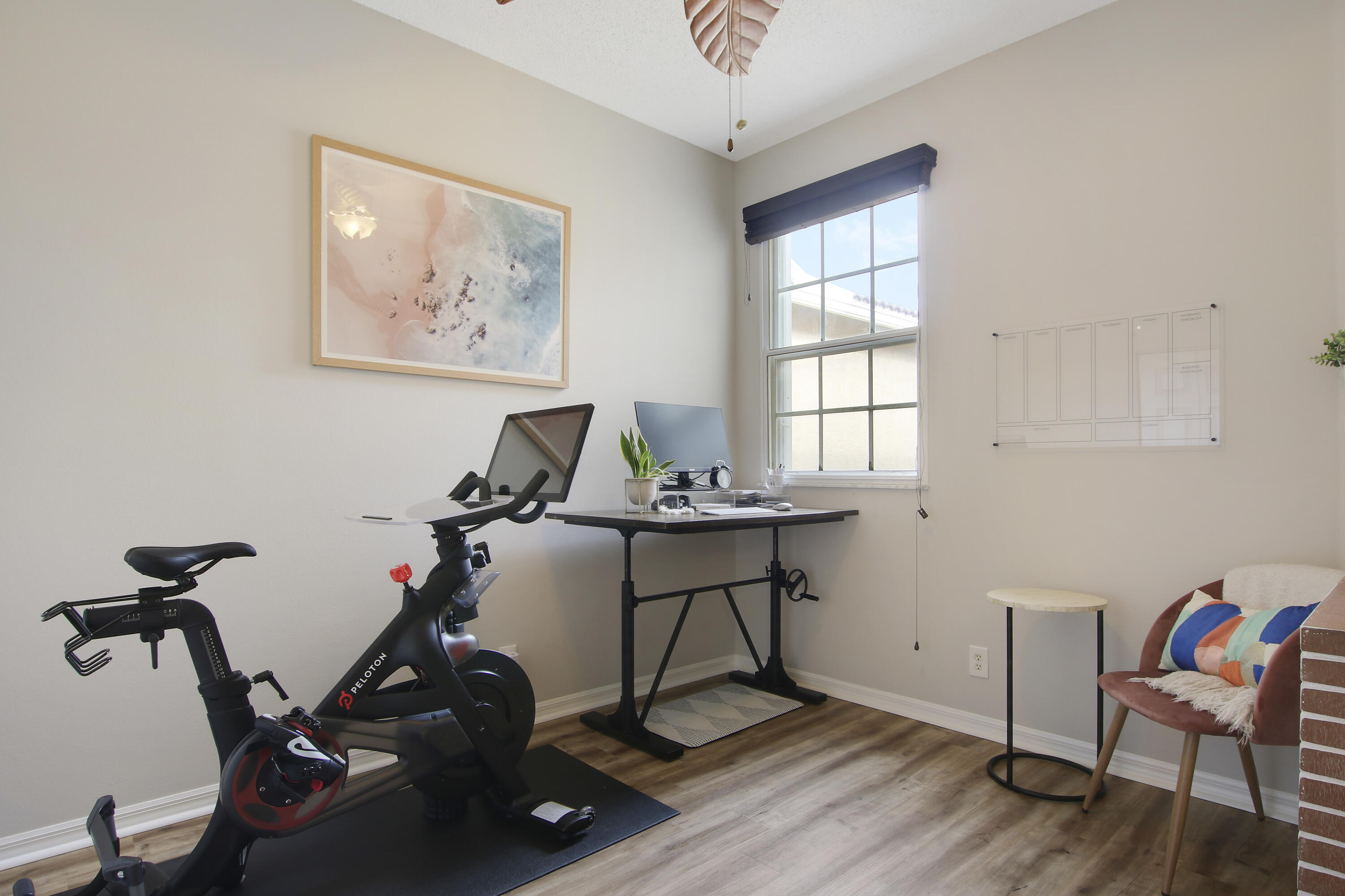 115 Lighthouse Circle, Unit D Tequesta, FL 33469 - Photo 25 of 28 a view of a workspace with furniture and a window