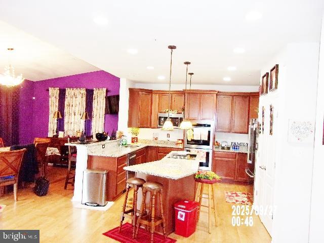 11612 Neon Road Fort Washington, MD 20744 - Photo 15 of 75 Center Cook-top Island and Pendant Lights