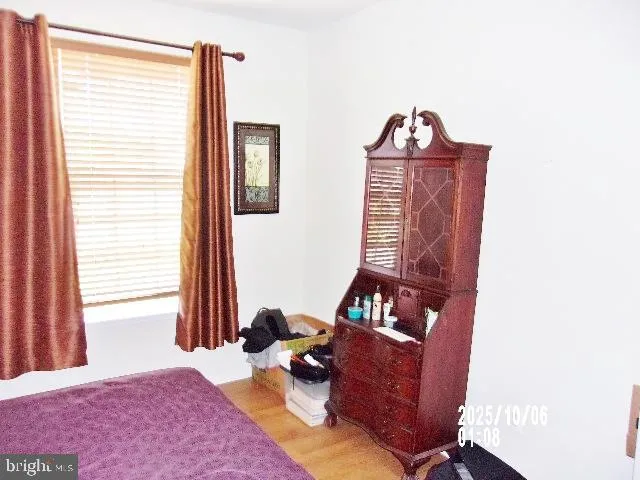a view of a livingroom with furniture and staircase