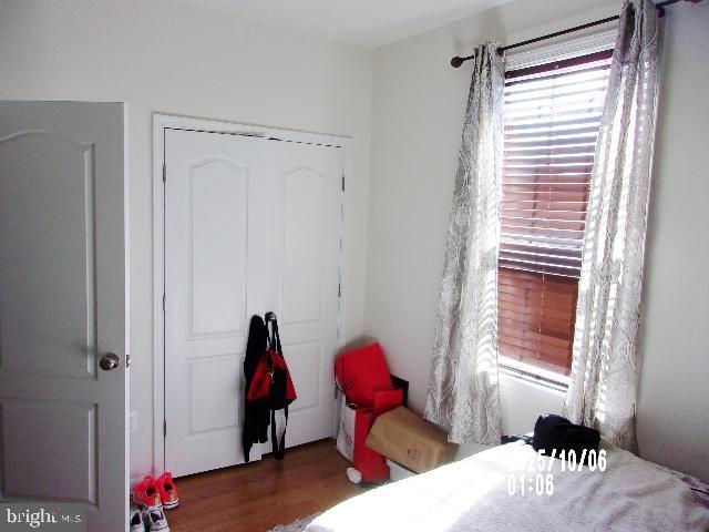 11612 Neon Road Fort Washington, MD 20744 - Photo 24 of 75 a living room with furniture and wooden floor