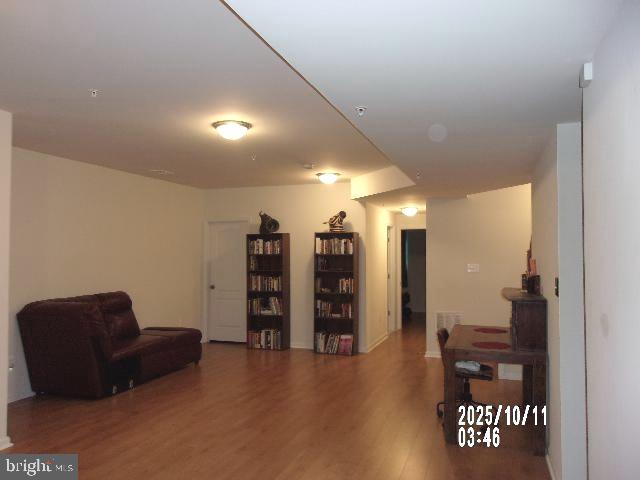 11612 Neon Road Fort Washington, MD 20744 - Photo 55 of 75 a view of a livingroom with furniture and staircase