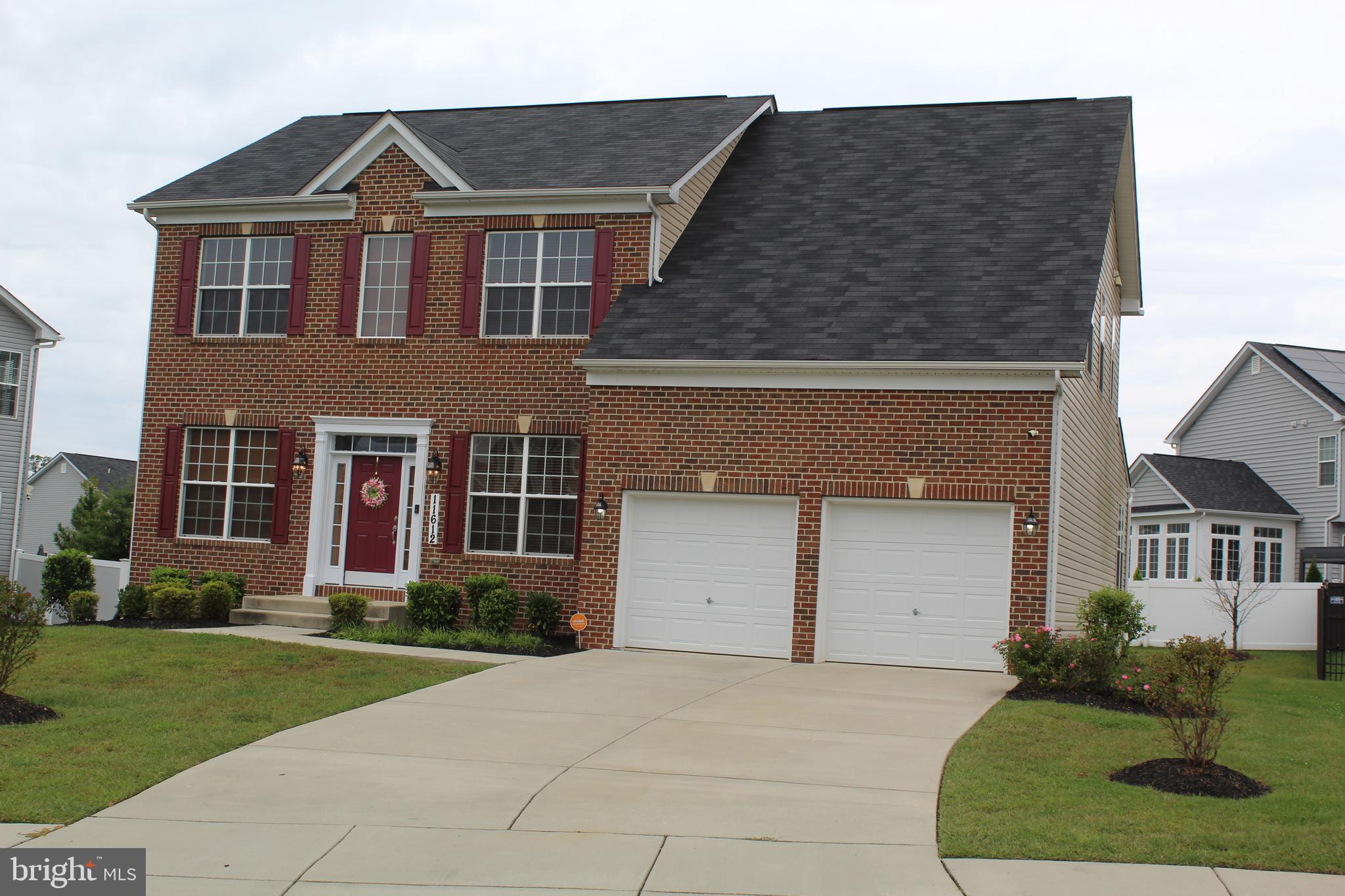 11612 Neon Road Fort Washington, MD 20744 - Photo 62 of 75 front view of a house with a yard