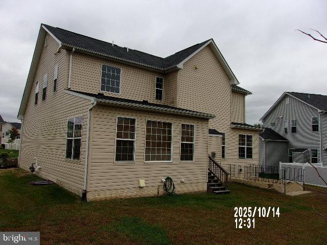 11612 Neon Road Fort Washington, MD 20744 - Photo 67 of 75 a front view of a house with a yard