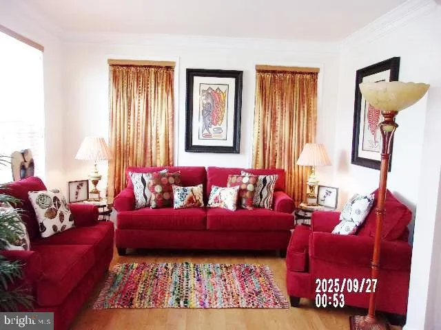 a bathroom with a toilet and a shower curtain