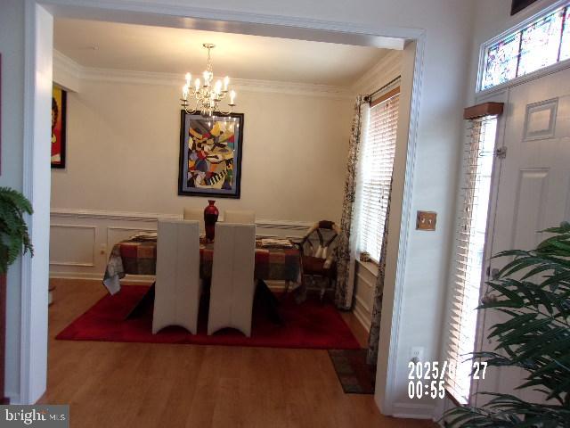 11612 Neon Road Fort Washington, MD 20744 - Photo 8 of 75 a view of a workspace with furniture and a potted plant