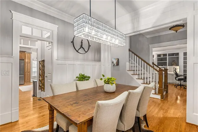 a kitchen with stainless steel appliances granite countertop a refrigerator and cabinets