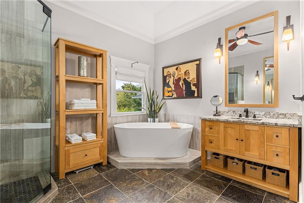 280 Sutherland Place Northeast Atlanta, GA 30307 - Photo 28 of 66 a spacious bathroom with a bathtub shower sink mirror and toilet
