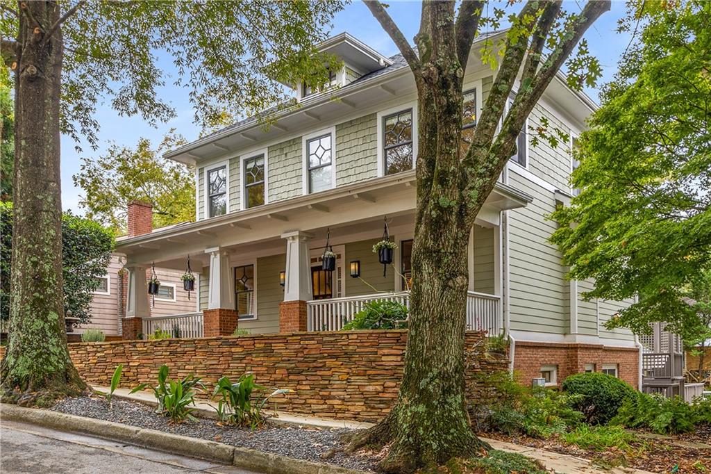 280 Sutherland Place Northeast Atlanta, GA 30307 - Photo 3 of 66 front view of a house with a tree